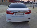 Toyota Camry 2013 года за 10 500 000 тг. в Жанаозен – фото 4