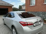 Toyota Corolla 2015 года за 7 000 000 тг. в Актобе – фото 4