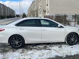 Toyota Camry 2015 года за 6 400 000 тг. в Актобе – фото 3