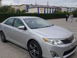 Toyota Camry 2014 годаfor6 500 000 тг. в Актобе