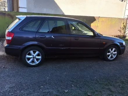 Mazda 323 1999 года за 1 800 000 тг. в Алматы – фото 4