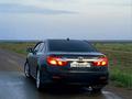 Toyota Camry 2014 года за 7 800 000 тг. в Шымкент – фото 2