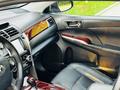Toyota Camry 2014 года за 7 800 000 тг. в Шымкент – фото 20