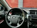 Toyota Camry 2014 года за 7 800 000 тг. в Шымкент – фото 22
