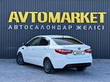 Kia Rio 2013 года за 4 800 000 тг. в Актобе – фото 4