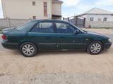 Mazda 626 1998 года за 1 850 000 тг. в Актау – фото 4