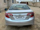 Toyota Camry 2014 года за 6 000 000 тг. в Актау – фото 2