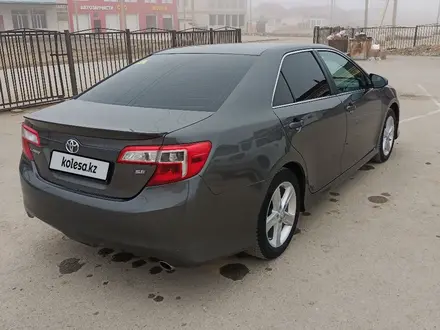 Toyota Camry 2013 года за 9 000 000 тг. в Жанаозен – фото 3