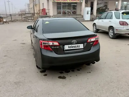 Toyota Camry 2013 года за 9 000 000 тг. в Жанаозен – фото 4