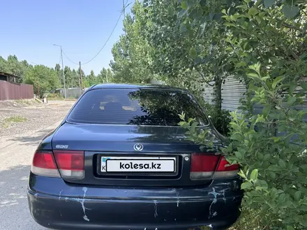 Mazda 626 1994 года за 750 000 тг. в Алматы – фото 5
