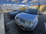 Mitsubishi Pajero Sport 2013 годаүшін9 000 000 тг. в Рудный – фото 2