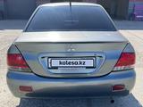 Mitsubishi Lancer 2006 годаfor1 750 000 тг. в Атырау – фото 3