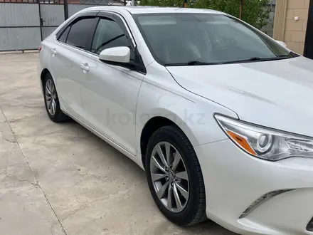 Toyota Camry 2016 года за 11 200 000 тг. в Атырау – фото 28