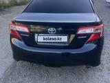 Toyota Camry 2014 годаүшін7 200 000 тг. в Уральск – фото 2