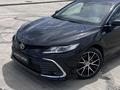 Toyota Camry 2023 года за 14 200 000 тг. в Астана