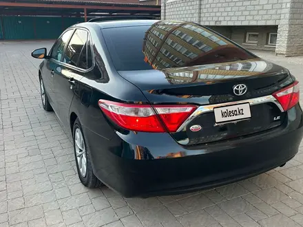 Toyota Camry 2015 года за 6 700 000 тг. в Актобе – фото 4