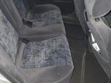 Toyota Carina E 1997 года за 1 800 000 тг. в Шымкент – фото 5