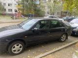 Nissan Primera 1997 года за 1 100 000 тг. в Караганда – фото 2