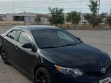 Toyota Camry 2014 года за 6 500 000 тг. в Жанаозен