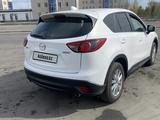 Mazda CX-5 2014 года за 9 500 000 тг. в Астана – фото 2