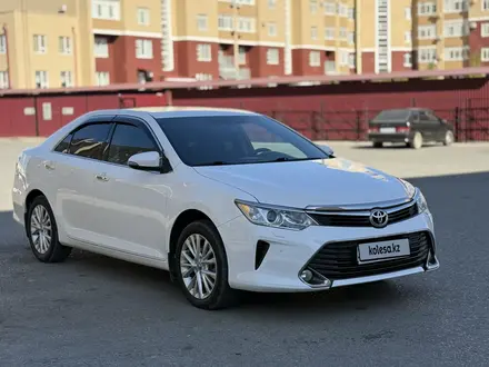 Toyota Camry 2014 года за 11 000 000 тг. в Актобе – фото 4