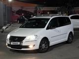 Volkswagen Touran 2010 года за 6 200 000 тг. в Шымкент