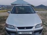 Mitsubishi Space Star 2003 годаүшін2 400 000 тг. в Шымкент