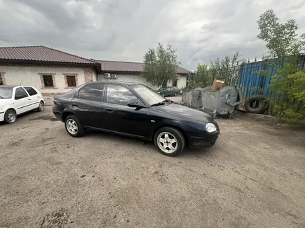 Kia Shuma 1998 года за 700 000 тг. в Астана – фото 3