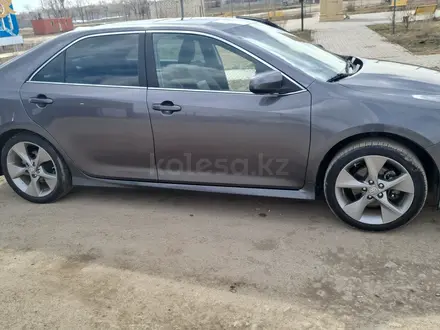 Toyota Camry 2014 года за 6 600 000 тг. в Актобе – фото 3