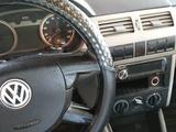 Volkswagen Gol 2004 года за 650 000 тг. в Жетиген – фото 4