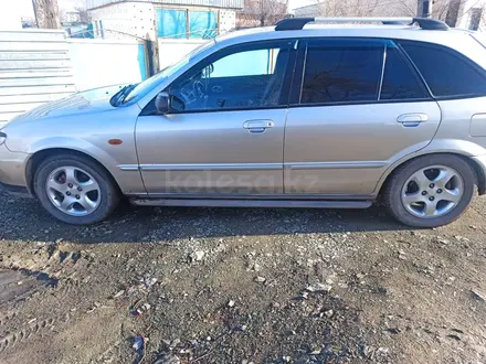 Mazda 323 2003 года за 2 200 000 тг. в Агадырь – фото 3