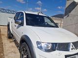 Mitsubishi L200 2013 года за 5 000 000 тг. в Атырау – фото 2