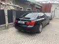 BMW 750 2009 года за 9 500 000 тг. в Алматы – фото 4