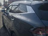 Kia Sportage 2025 года за 19 500 000 тг. в Алматы – фото 4