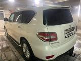 Nissan Patrol 2013 года за 14 990 000 тг. в Павлодар – фото 2