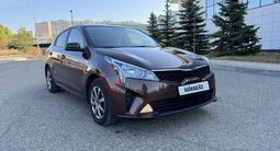 Kia Rio 2021 года за 8 000 000 тг. в Караганда – фото 2