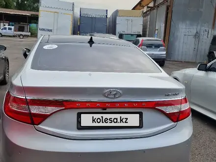 Hyundai Grandeur 2014 года за 8 750 000 тг. в Жетиген – фото 49