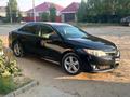 Toyota Camry 2014 года за 8 200 000 тг. в Актобе – фото 4