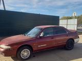 Mazda Cronos 1996 года за 490 000 тг. в Астана – фото 2