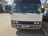 Toyota  Coaster 2013 года за 15 500 000 тг. в Астана – фото 4