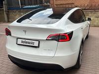 Tesla Model Y 2023 года за 28 500 000 тг. в Алматы