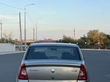 Renault Logan 2014 года за 3 000 000 тг. в Атырау – фото 4