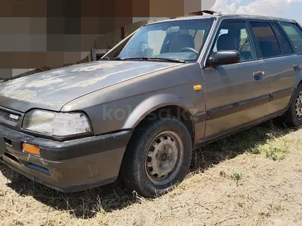 Mazda 323 1993 года за 550 000 тг. в Жетиген – фото 4