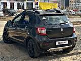 Renault Sandero Stepway 2015 года за 2 999 999 тг. в Уральск – фото 4