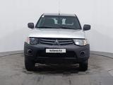 Mitsubishi L200 2011 года за 3 350 000 тг. в Астана – фото 2