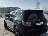 Nissan Patrol 2011 года за 10 900 000 тг. в Астана