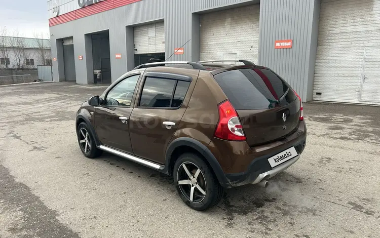 Renault Sandero Stepway 2013 годаүшін4 100 000 тг. в Актобе