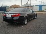 Toyota Camry 2014 года за 7 500 000 тг. в Астана – фото 4
