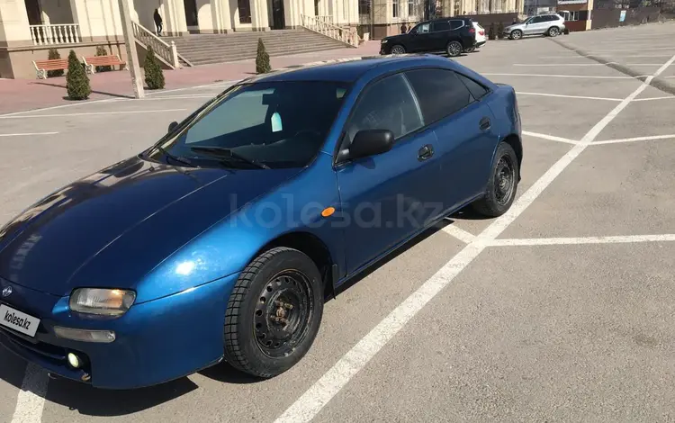 Mazda 323 1998 годаүшін1 200 000 тг. в Алматы