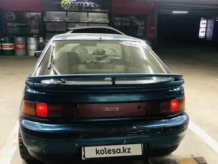 Mazda 323 1992 года за 750 000 тг. в Астана – фото 6